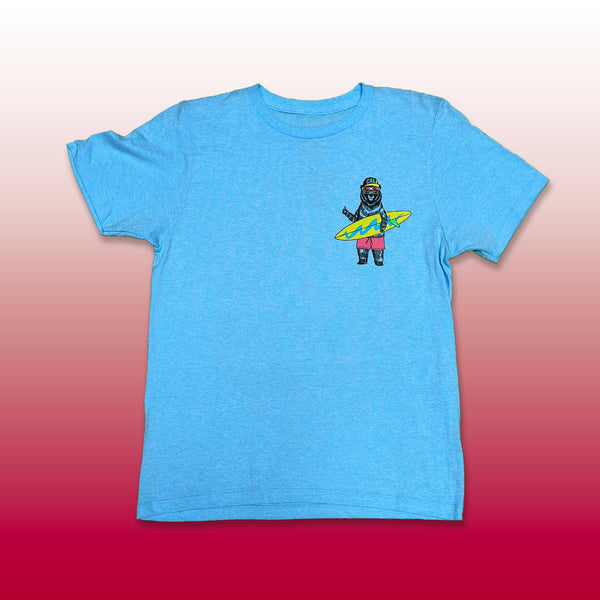 Custom screen printed light blue t-shirt with surfer bigfoot character holding surfboard chest print